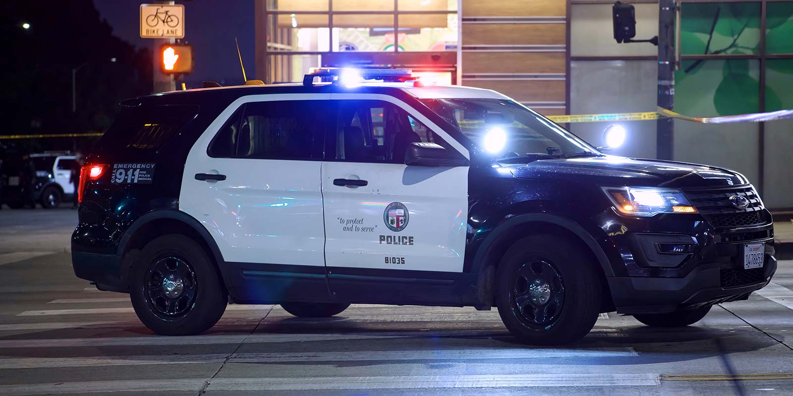 police car at night with lights on