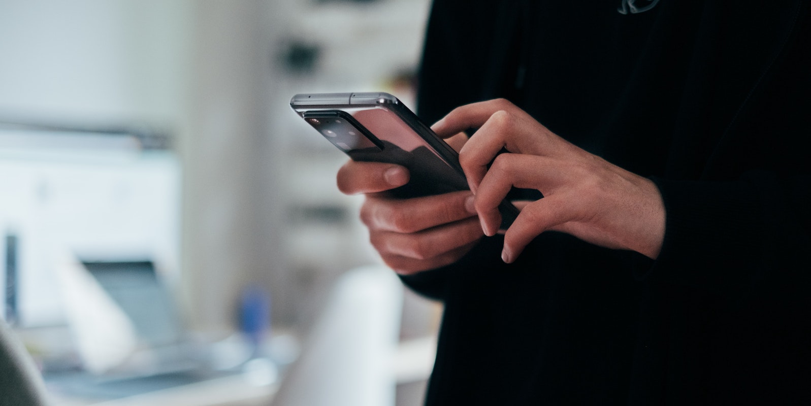 Close up of hands with a smart phone