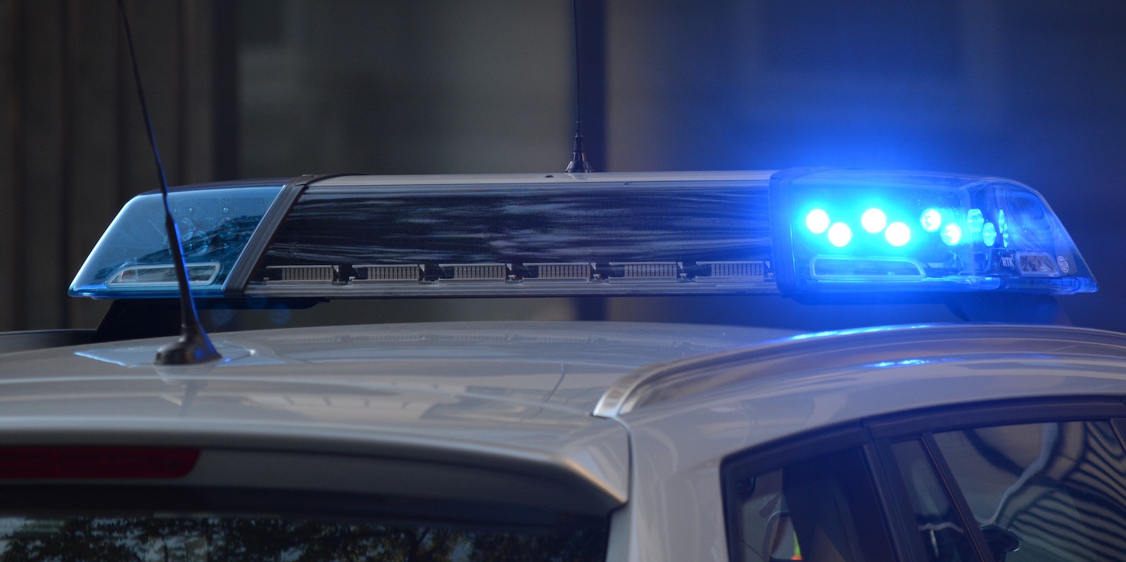 Blue lights on top of a police car